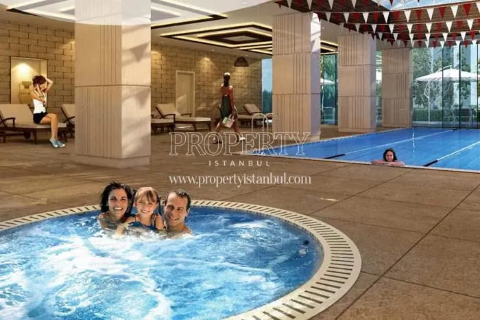 The family swimming in the pool in Sky Blue Istanbul