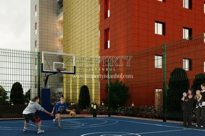 The boys playing basketball in the Sky Blue Istanbul compound