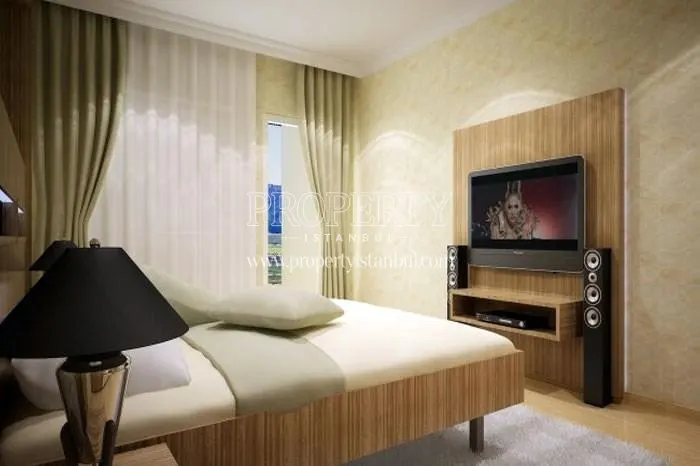 Small master bedroom with a TV in Sky Moon Star Residence