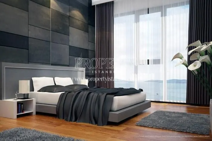 Black and white master bedroom in Sonay Suites
