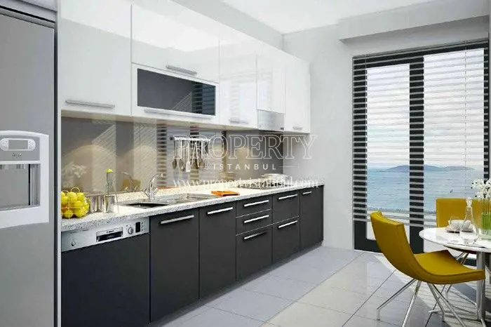Black and white kitchen in Sonay Suites