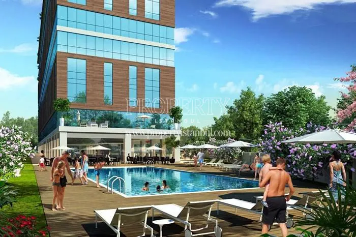 Star Port Residence residents swimming in the compound pool