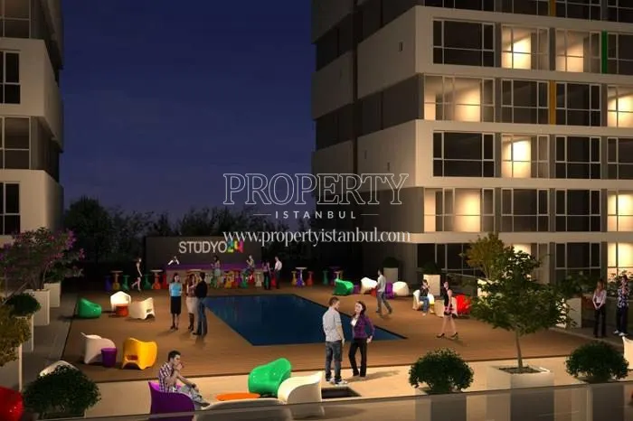 The residents of Studyo 24 having a party near the swimming pool