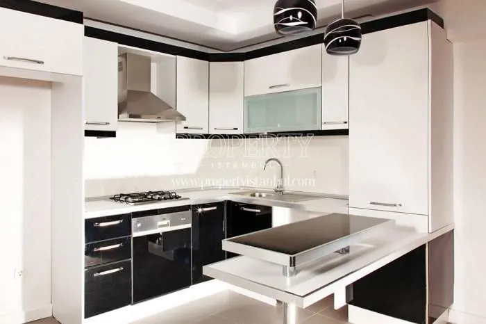 White and black kitchen in Sultan Konutlari