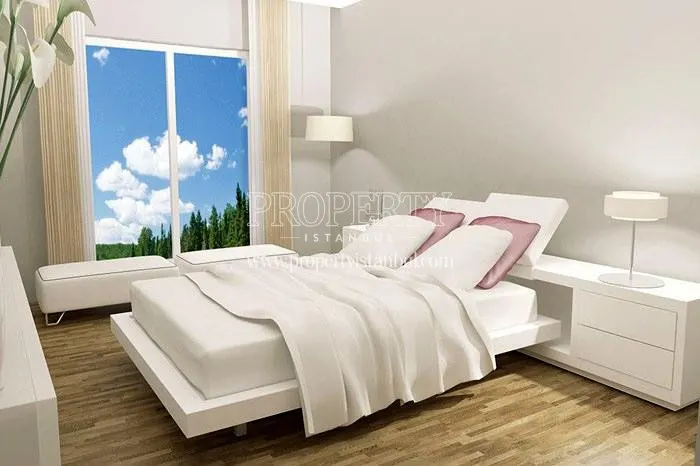 White bed with white walls in one of the Sunlife Tuzla homes