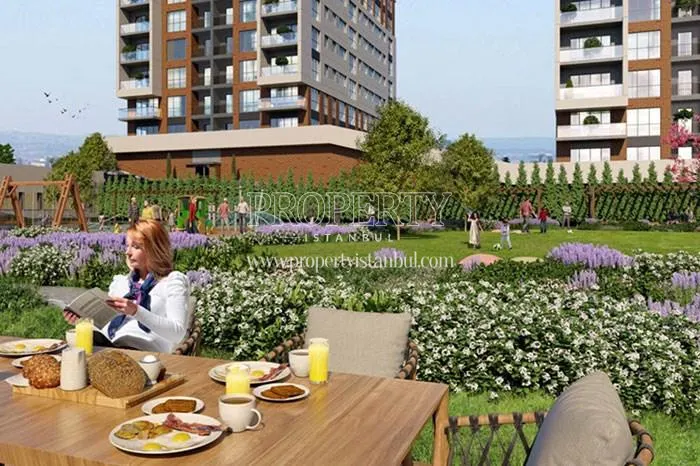 TEM Avrasya Konutlari residents having breakfast in the compound garden