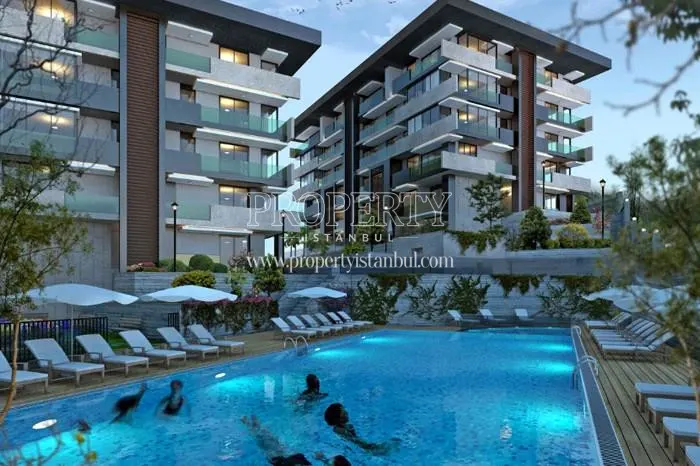 People swimming in the compound swimming pool in Tarabya Life