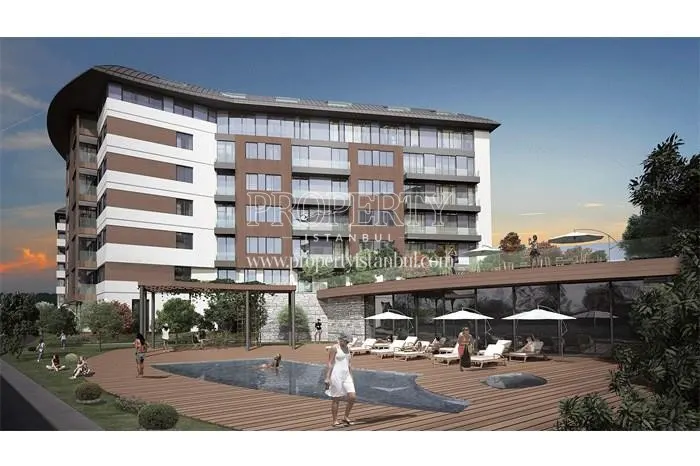 Terrace Koru residents swimming in the compound pool