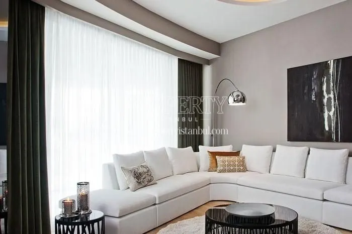 White corner sofa in one of the living rooms in Terrace Tema