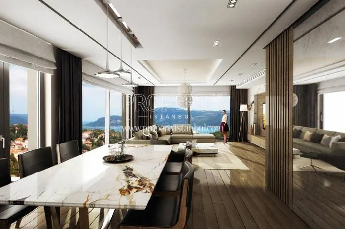 The woman looking at the sea from the living room in Therra Park Tarabya