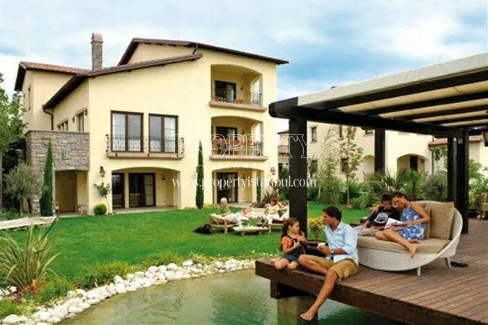 A family enjoying the Toskana Vadisi compound garden