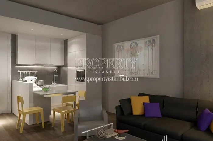 Small living room with a black sofa in Toya Next