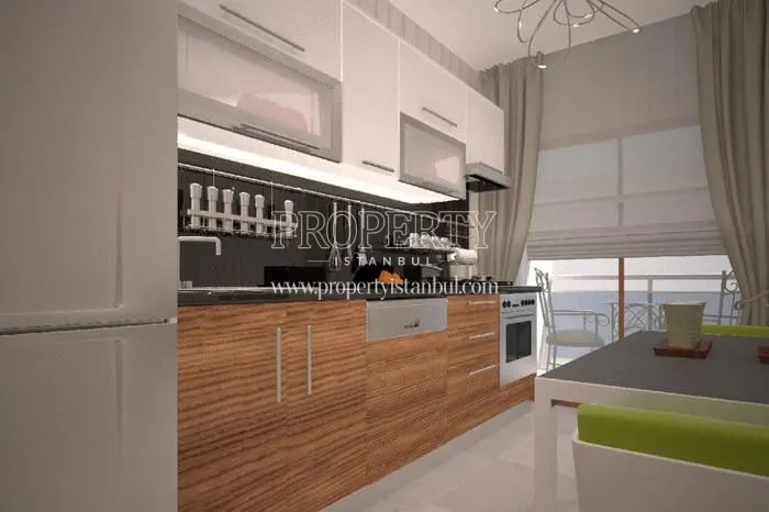The kitchen with a balcony in Turkuaz Gunesli