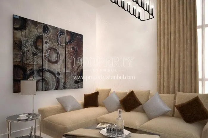 The living room with a small corner sofa in Turkuaz Gunesli