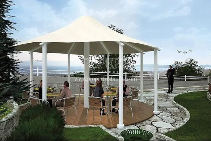 Families enjoying the white pergola in the Twinstar Yakacik compound
