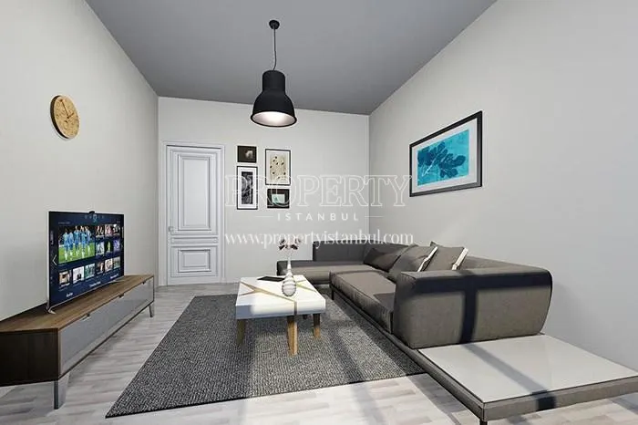 Small living room having a grey corner sofa in Venara Bagcilar