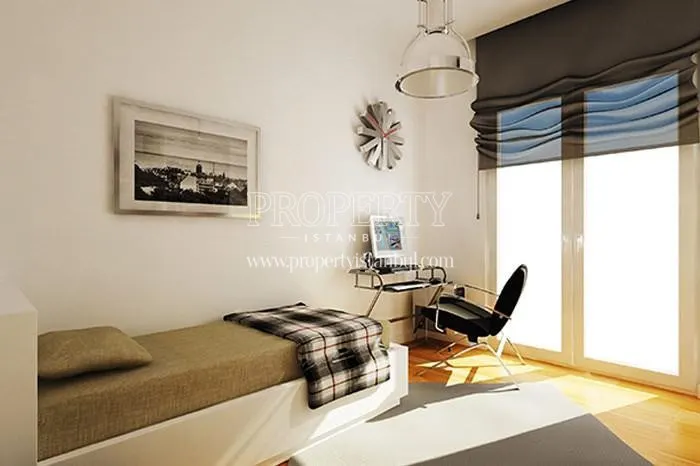 The bedroom having a small study desk in Vezuv Konaklari