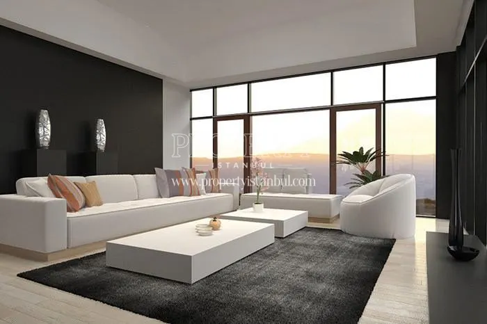 The living room with a white lounge suite in West Side Istanbul