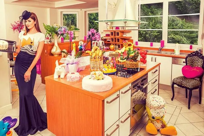 The woman in the kitchen in West Wall Marina Villalari