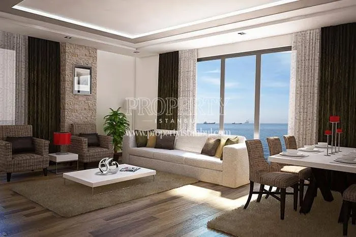 The living room with the sea view in Yasemin Evleri