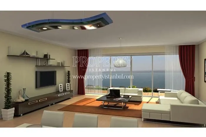 White furniture in the living room with red curtains in Yenimoda Evleri