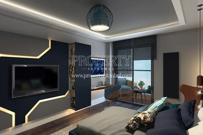 The bedroom with a television in Yonca Villapark