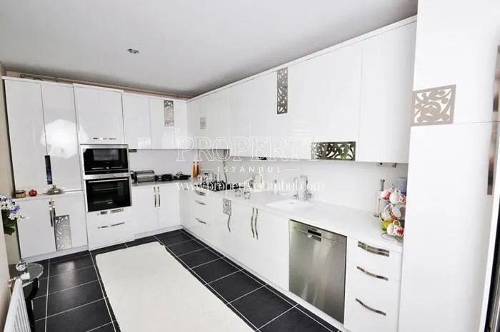 Spacious white kitchen in Zeytindali Konaklari