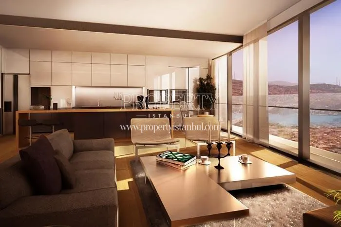 The kitchen and living room separated by a glass door in Zorlu Center