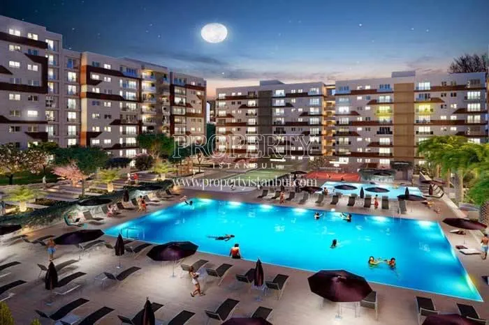 Dore Life residents swimming in the compound pool
