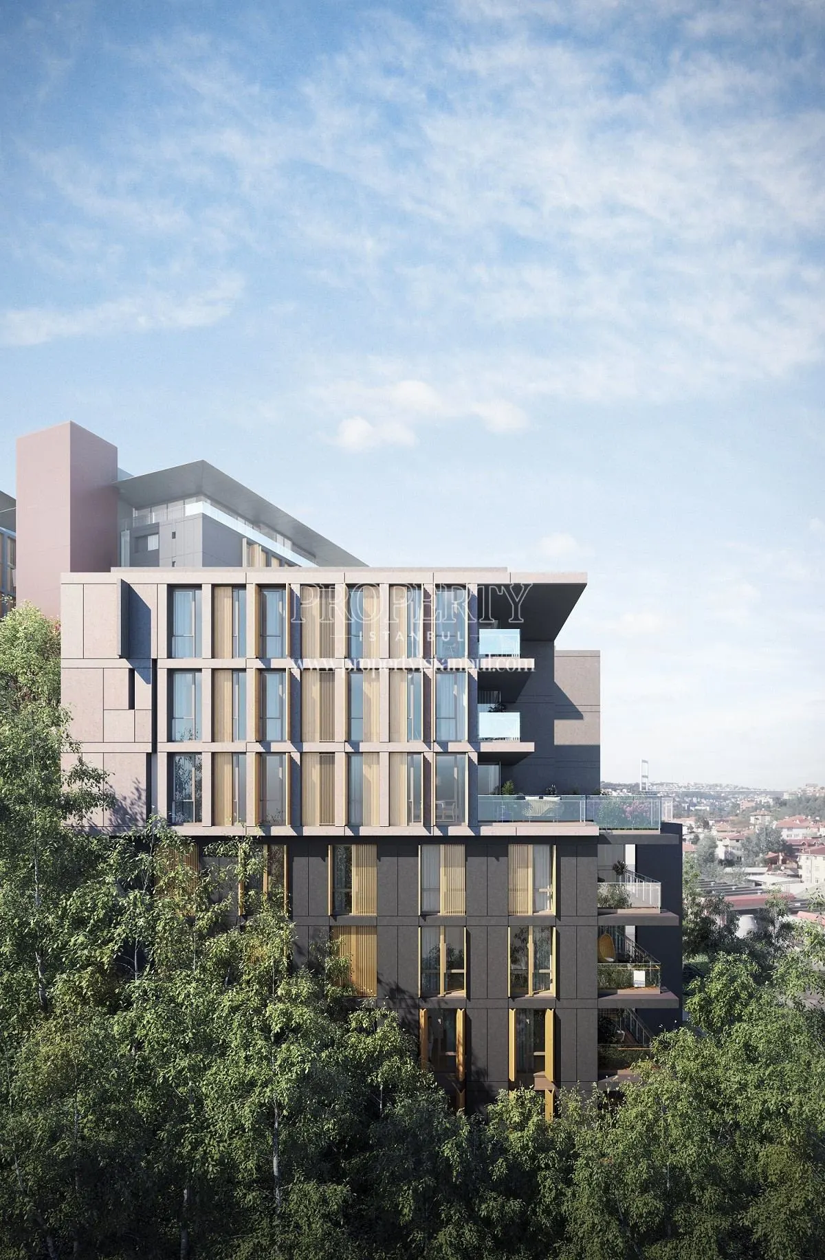 One of the buildings of the Nef Kandilli project among the trees