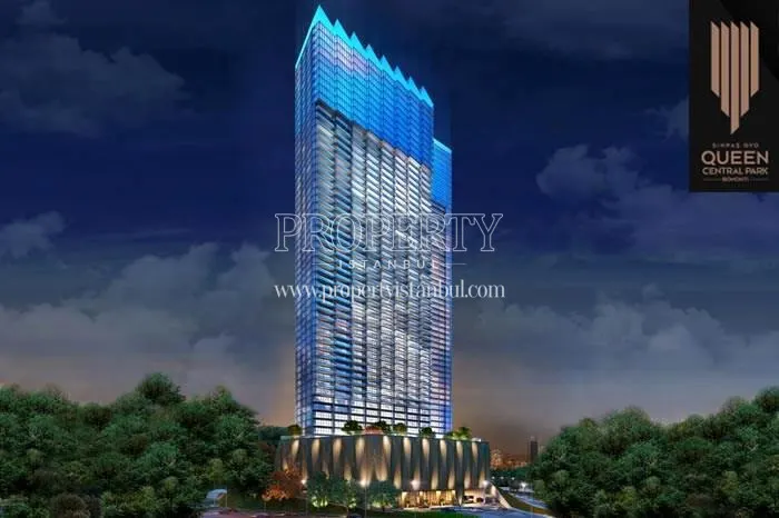 Queen Central Park tower at night