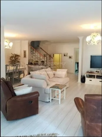 A living room of a duplex unit in Agaoglu My Home Cengelkoy