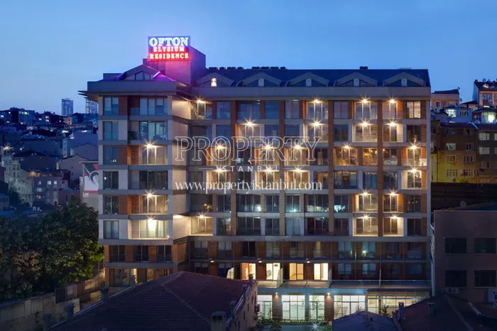 Elysium Residence Taksim building at night