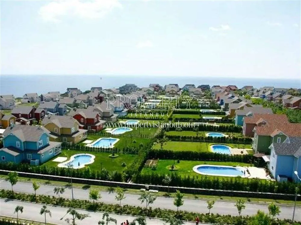 A house among the Sunflower Altinorak houses with swimming pools
