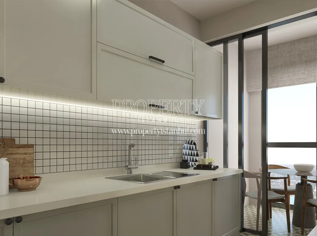 White kitchen with a balcony in AND Frekans