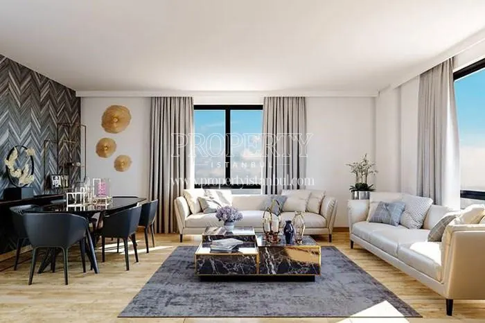 The living room with a white lounge suite in Sapphire Hill Kurtkoy