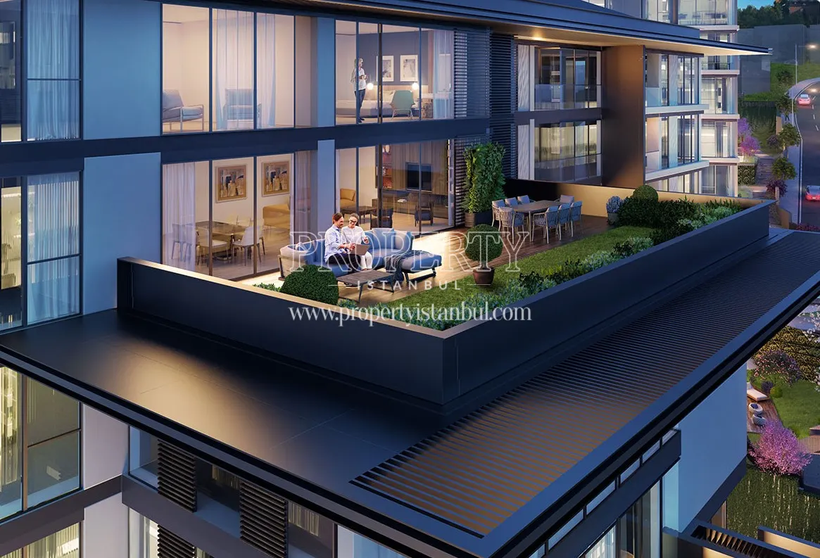 Couple enjoying themselves on their terrace in the Forev Modern Eyup project