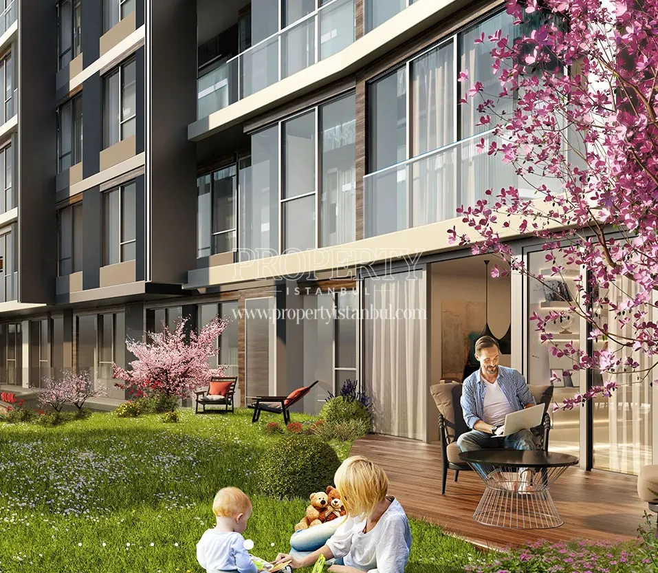 Family enjoying themselves in their garden in Forev Modern Eyup