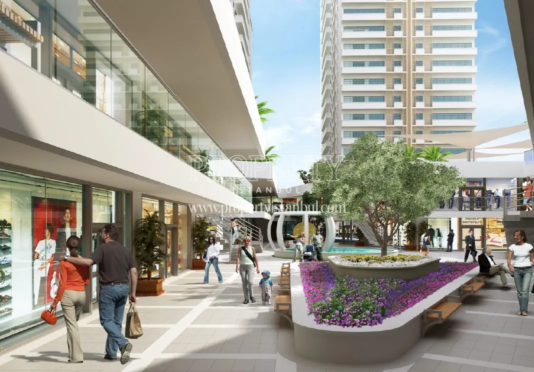 People in Yalcintepe Residence's shopping center