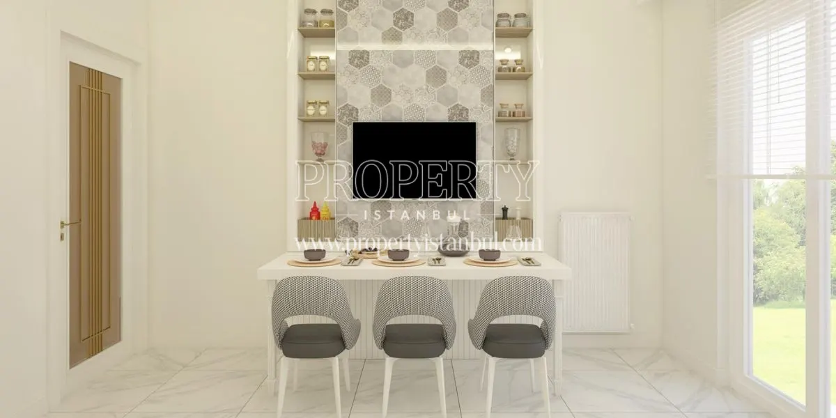A table in front of a TV in Alya Mercan Project