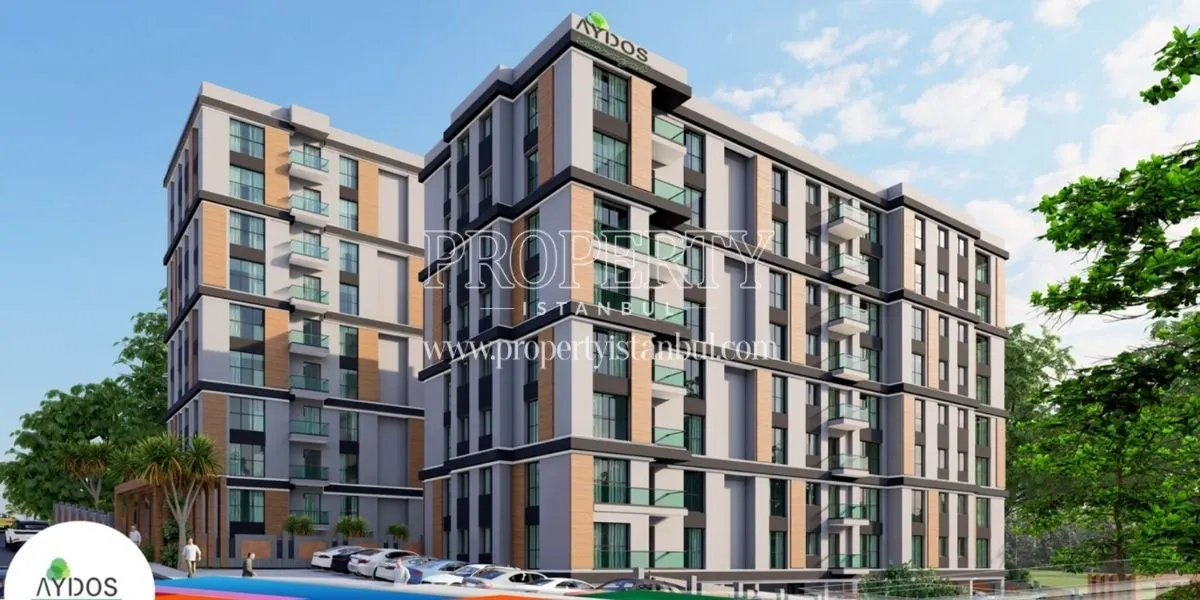 A building with its parking lot in Aydos Sehrazat project
