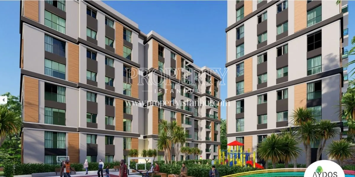 Two buildings with their playground in Aydos Sehrazat project