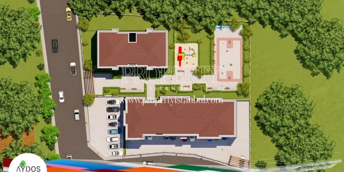 A basketball court, a playground and a parking lot in Aydos Sehrazat project