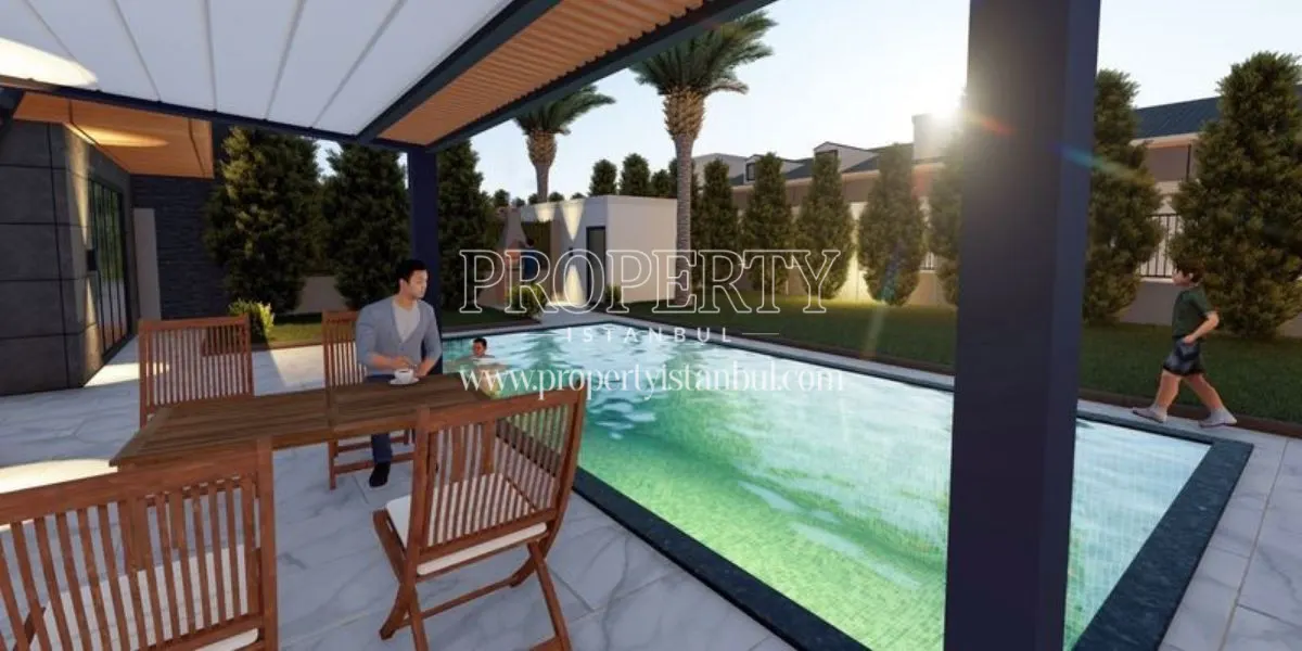 A pool and a garden in the Mavera Villa Etap 2 project