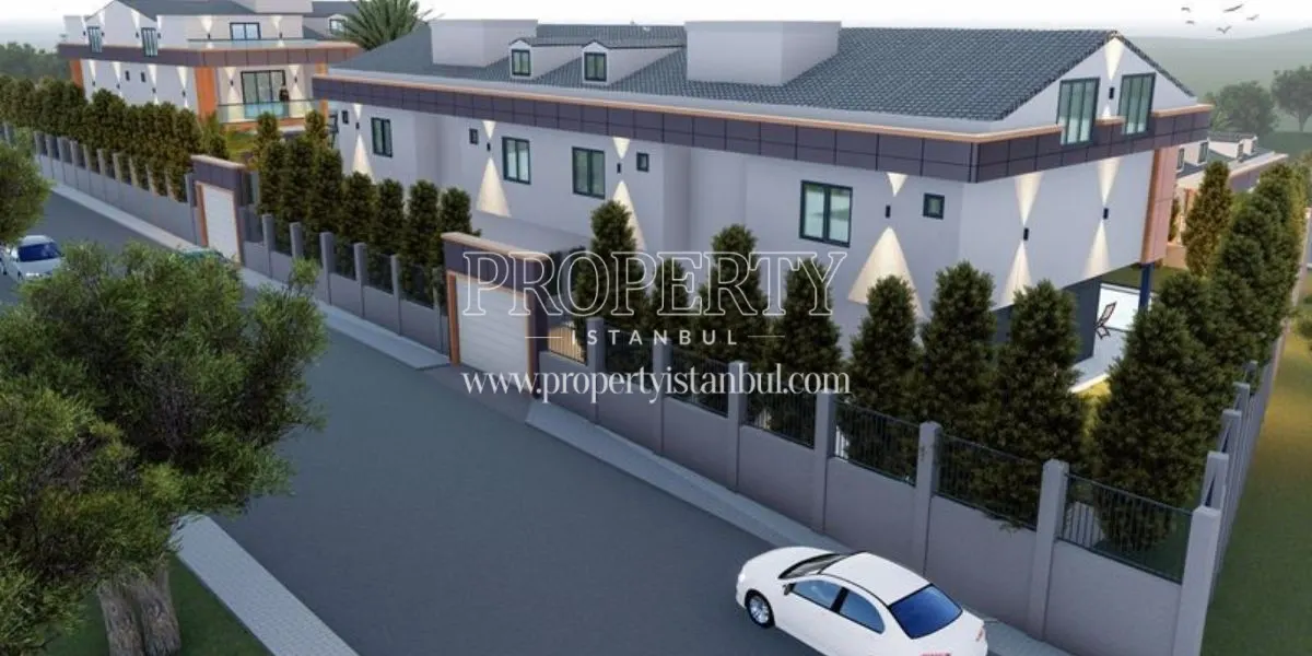 A car in front of the gate of the Mavera Villa Etap 2 project