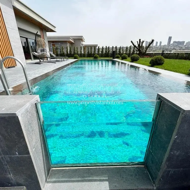 Swimming pool area of a villa in the Brand Vadi project