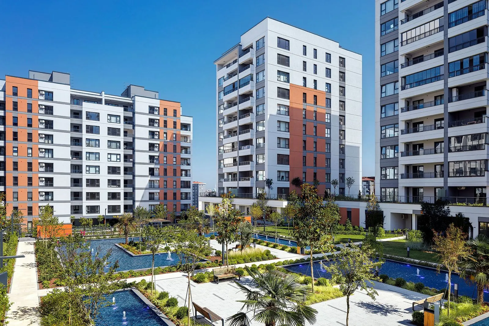 Gardens and pools between the Avrupa Konutlari Yenimahalle blocks