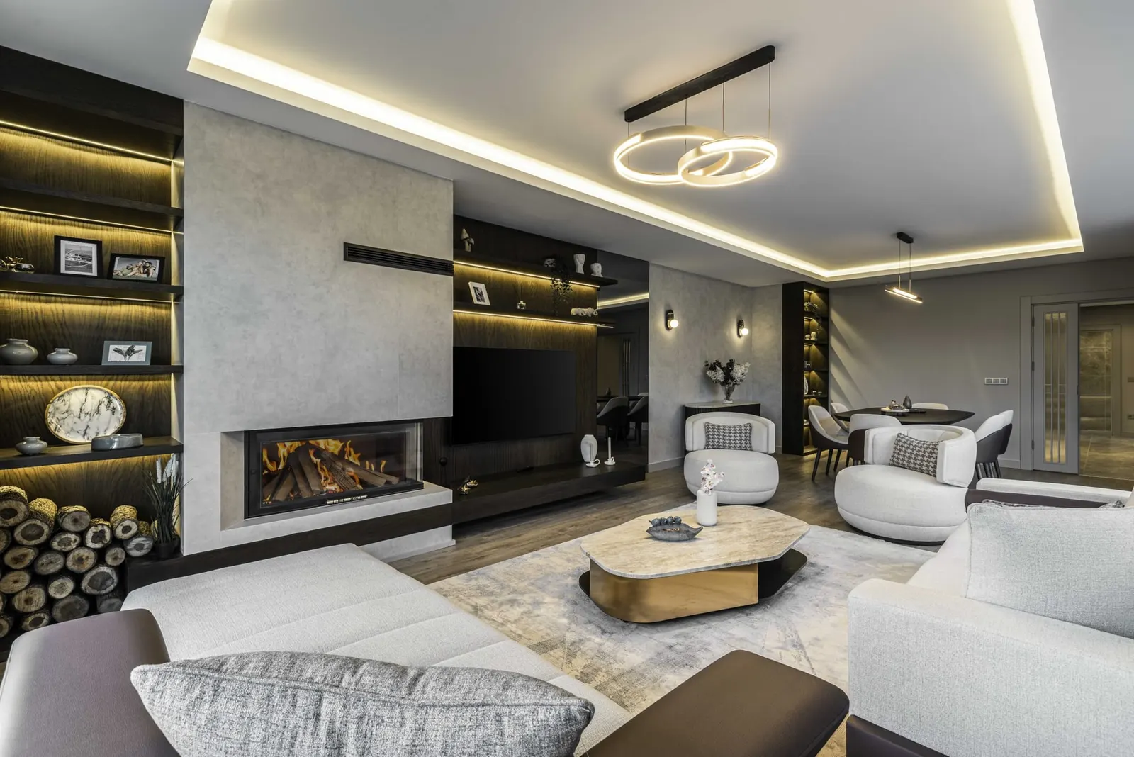 Living room with a fireplace in a Ballica Panorama villa