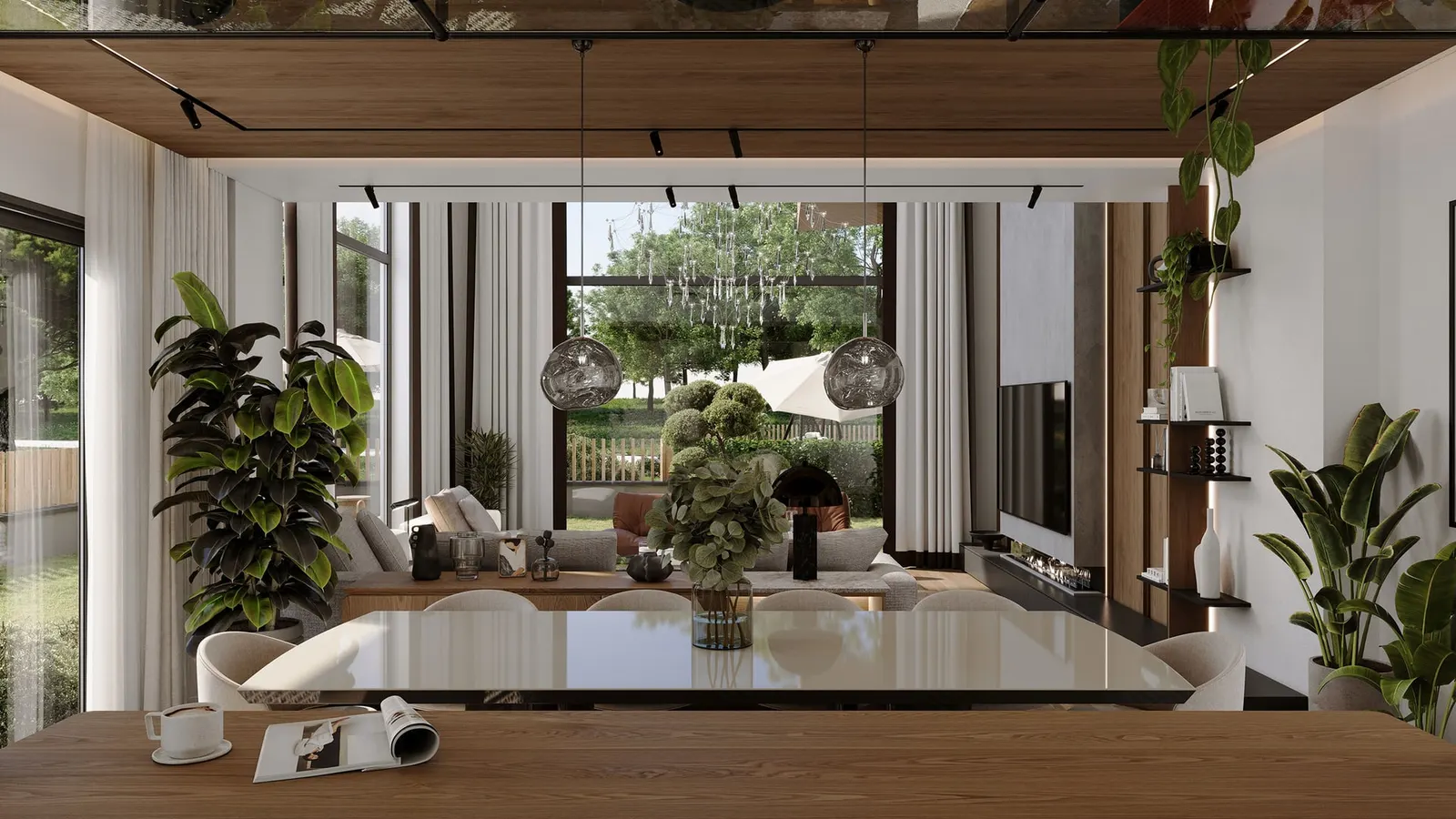 Living room opening to the garden in a Demirhan Fuente duplex