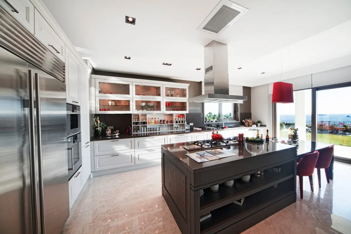 Kitchen with an island in the Deniz Istanbul Marina Evleri show villa